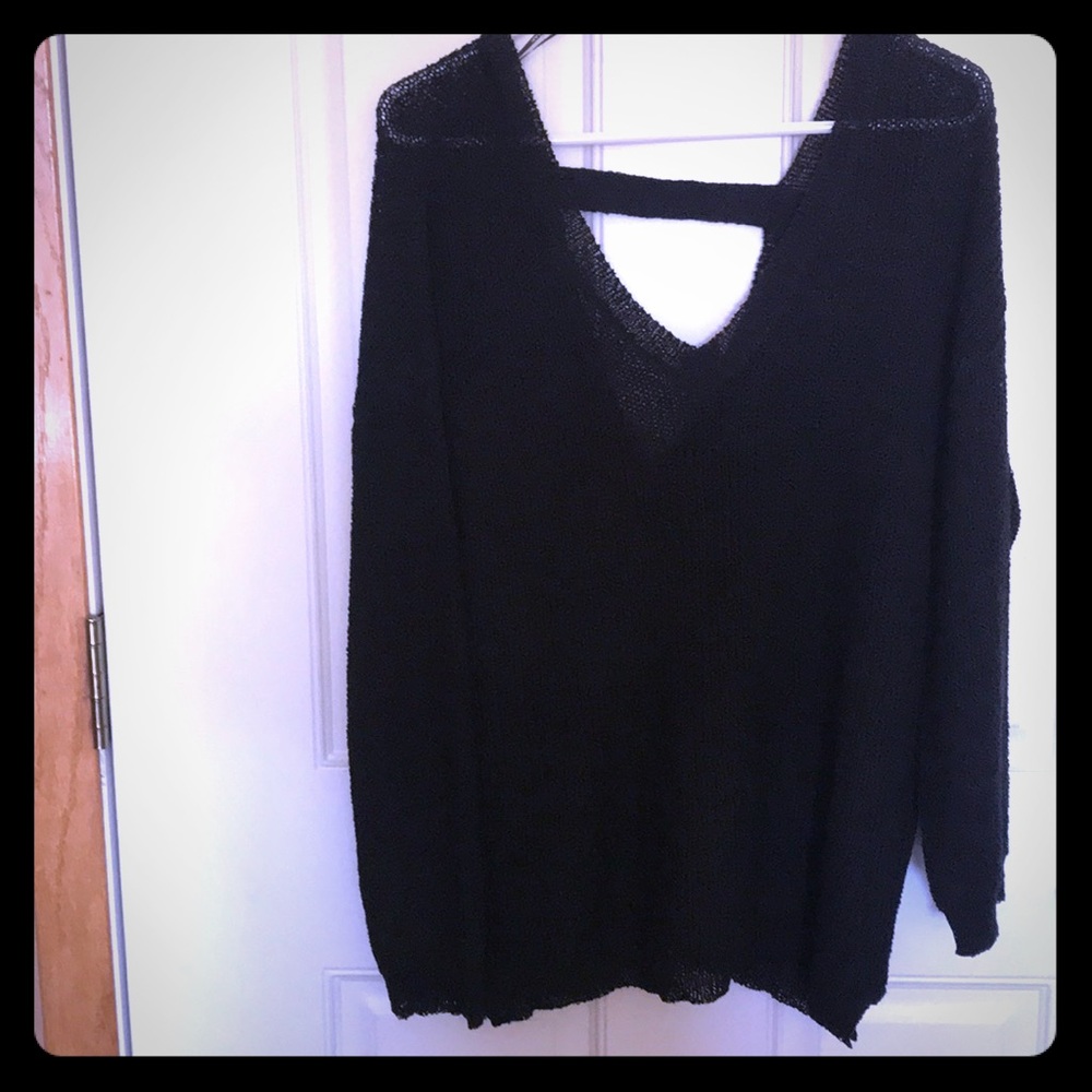 Light knit black sweater. Never worn!